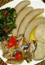 Carib Comfort breakfast — sausage, callaloo, tin mackerel and boiled dumplings