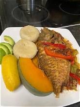 Carib Comfort breakfast — steamed fish with boiled banana, dumplings and pumpkin